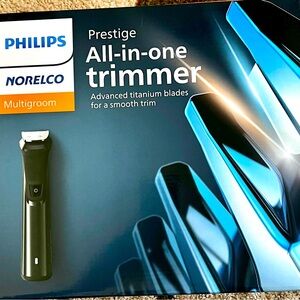 New in Box Philips Norelco multi groom Prestige
